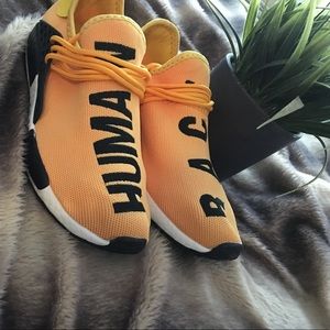 Human race logo sneakers